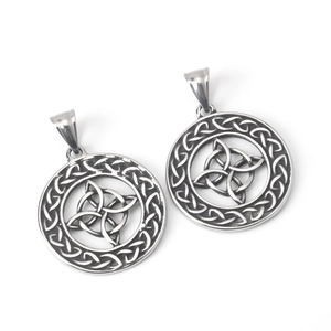 Vintage stainless steel Celtic shield knot necklace with intricate woven circular patterns