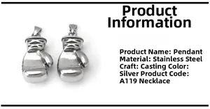 Macro shot of silver stainless steel boxing glove pendants with realistic stitch textures
