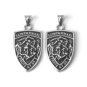 Detailed relief of Saint Michael shield pendant in vintage stainless steel finish