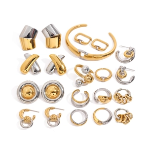 Minimalist two-tone stainless steel jewelry set including rings, earrings and bangle