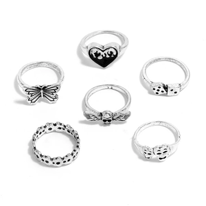 6-piece vintage silver gothic ring set featuring butterfly heart and skull designs