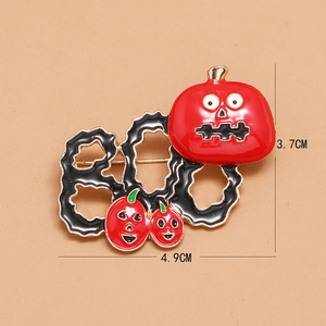 Halloween enamel pin with BOO lettering and red pumpkin faces in black alloy metal