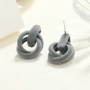 Detail of grey flocked interlaced hoop earrings with S925 silver needle texture