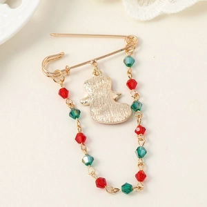 Christmas safety pin brooch with festive red and green beads and a golden charm