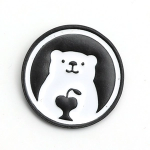 Minimalist black and white enamel pin featuring a cute cartoon polar bear holding a heart
