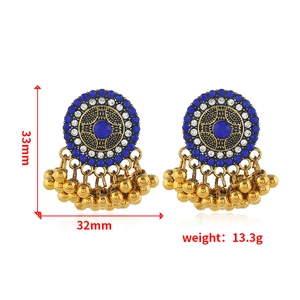 Detailed size view of retro turquoise earrings with crystal accents and gold bead tassels