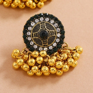 Vintage round turquoise style alloy earrings with black gems and gold beaded tassels