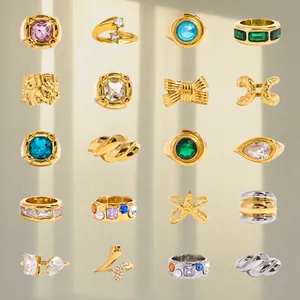 Collection of stainless steel zircon rings in gold and silver finishes with colorful stones
