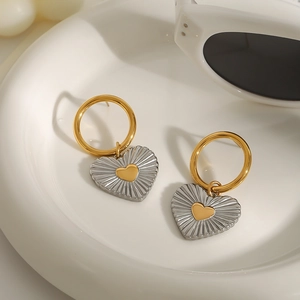Elegant two-tone heart drop earrings in gold and silver stainless steel design
