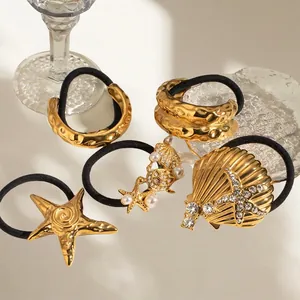 Élastiques à cheveux dorés avec motifs d'étoile de mer et coquillages, perles et strass