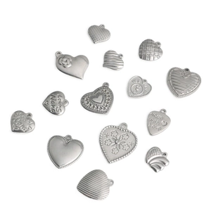 Set of 14 silver stainless steel heart pendants with assorted textures and engravings
