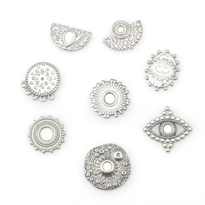 Otto ciondoli vintage in acciaio inox con stella e sole per creazione gioielli fai da te