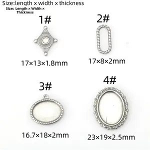 Detailed view of four stainless steel DIY pendant settings with distinct vintage patterns