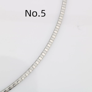 Macro view of silver stainless steel flat snake chain with polished and frosted links