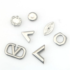 Lot d'accessoires de bijoux en acier inoxydable poli avec formes géométriques en V et rondes