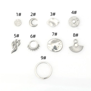 Detailed collection of nine stainless steel hip-hop style pendant charms for DIY jewelry making
