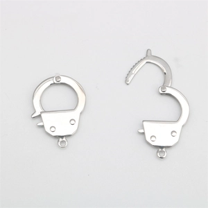 Polished stainless steel handcuff charms in closed and open states for DIY jewelry making