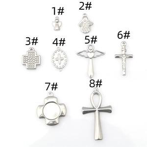 Selección de 8 dijes punk de acero inoxidable con ángel y cruz para joyería artesanal