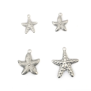 Lot de quatre pendentifs étoile de mer en acier inoxydable pour création de bijoux DIY
