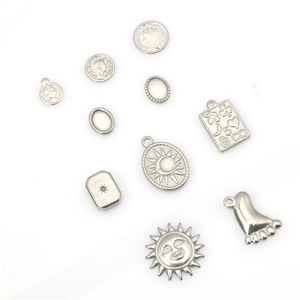 Variety of stainless steel sun and portrait charms in silver finish for DIY jewelry making