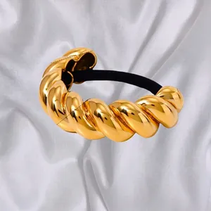 Eleganter goldener Metall-Haargummi mit gedrehter Textur und schwarzem Gummiband