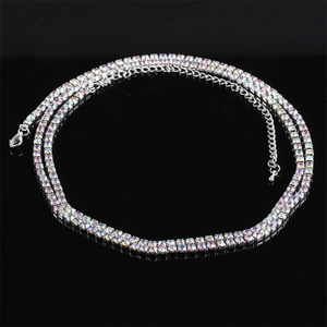 Silver double-row crystal body chain with iridescent AB rhinestones on black background
