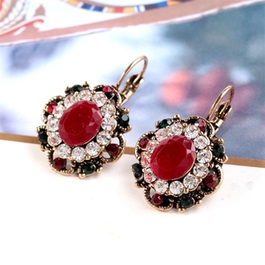 Vintage cluster flower drop earrings with red crystal and rhinestones in bronze finish
