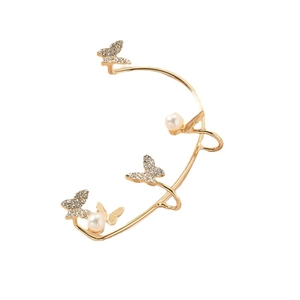 Elegant gold butterfly ear cuff with sparkling diamonds and white pearls on white background