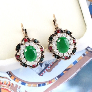 Vintage bronze drop earrings with green oval gemstone and colorful rhinestones
