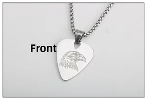 Detailed view of stainless steel guitar pick necklace with engraved eagle pattern