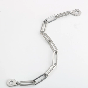 Detail shot of industrial stainless steel chain with oval links and lobster clasps