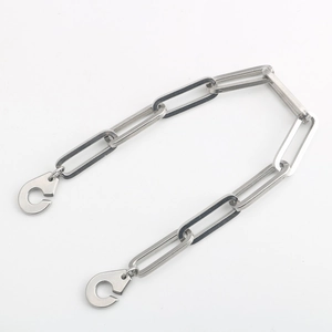 Close-up of industrial paperclip chain bracelet in polished stainless steel with C-clips