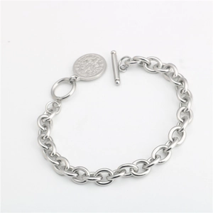 Vintage stainless steel St. Benedict medal bracelet with classic toggle clasp