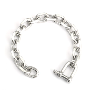 Industrial silver stainless steel O-chain bracelet featuring a horseshoe buckle closure