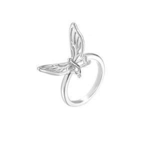 Minimalist silver double butterfly ring with intricate cutout wings and polished finish