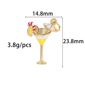 Detail showing 14K gold plated cocktail glass charm with dimensions 14.8mm and 23.8mm