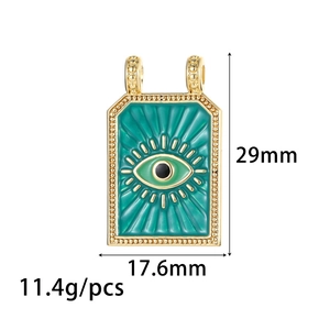 Vergulde evil eye tarot hanger ketting met groen emaille en geometrische gouden details