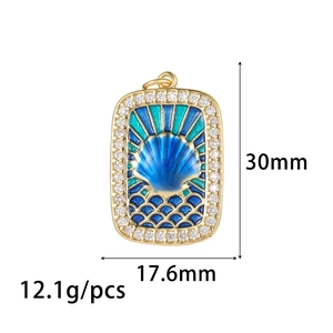 Gold tarot sea shell necklace pendant with blue enamel and sparkling zircon stones
