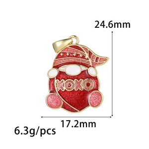 Macro shot of red enamel gnome pendant with XOXO text and 24.6mm height dimension