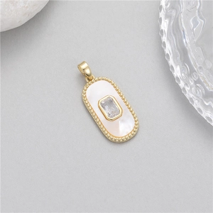 Gold plated oval pendant with white mother of pearl and emerald cut cubic zirconia