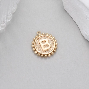 Golden 14K round coin pendant with embossed letter B and beaded edge for jewelry making
