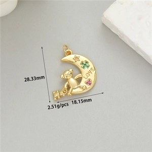 Detail of 14K gold-plated moon and bear pendant with LOVE engraving and colorful zircons