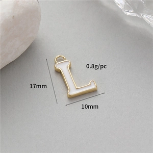 Detail view of a 17mm white enamel letter L charm with gold plating and dimensions