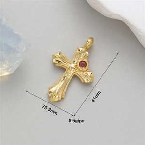 Golden cross pendant with red gemstone and vintage texture, size 41mm x 25.9mm details