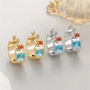 French vintage gold and silver hoops with blue zircon stones and pleated brass texture