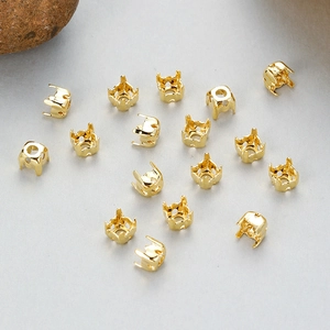 Detailed macro view of gold plated brass claw settings for DIY jewelry making and gemstone crafts