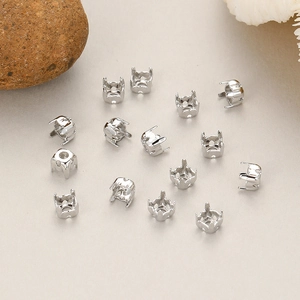 Various silver plated brass claw settings for DIY jewelry making with gems and pearls