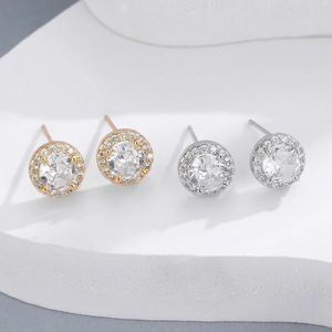 Elegant 925 silver needle halo stud earrings with round cubic zirconia in gold and silver