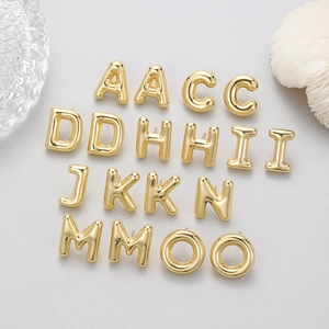Chic 3D bubble letter stud earrings in polished gold finish for a minimalist style