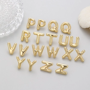 3D golden balloon alphabet stud earrings with a polished mirror finish from P to Z